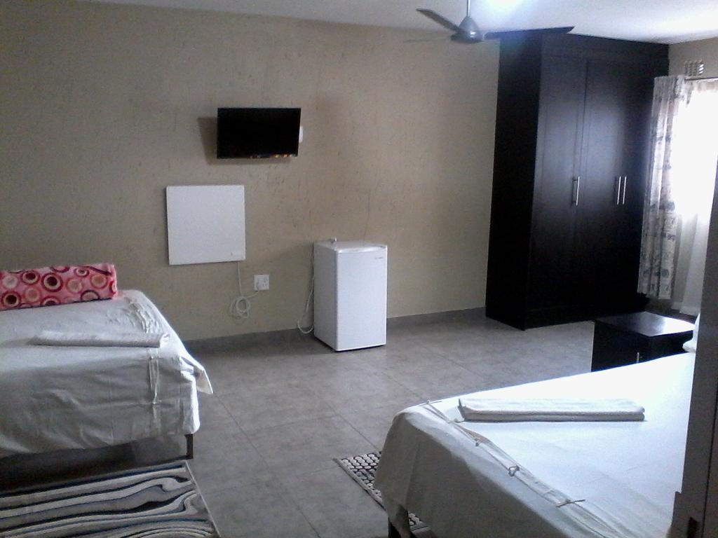 Chisam Guest Lodge Pty Ltd Йоганнесбурґ Номер фото
