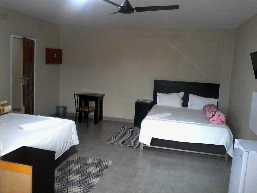 Chisam Guest Lodge Pty Ltd Йоганнесбурґ Номер фото