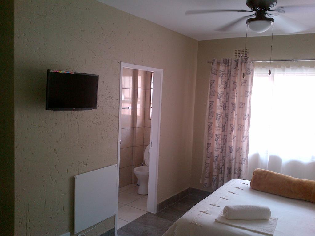 Chisam Guest Lodge Pty Ltd Йоганнесбурґ Номер фото