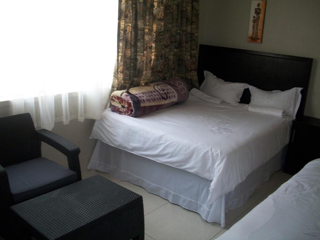 Chisam Guest Lodge Pty Ltd Йоганнесбурґ Номер фото
